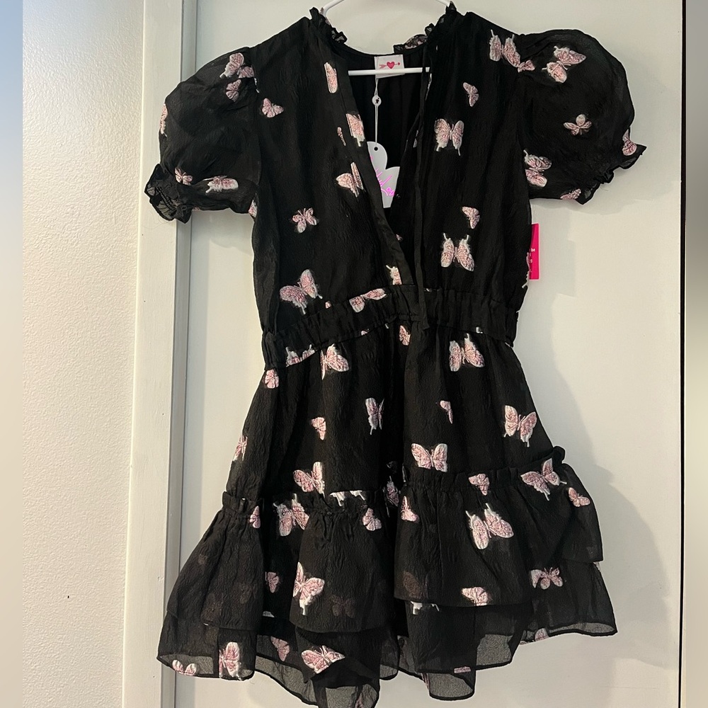 Black dress with sparkly pink butterflies